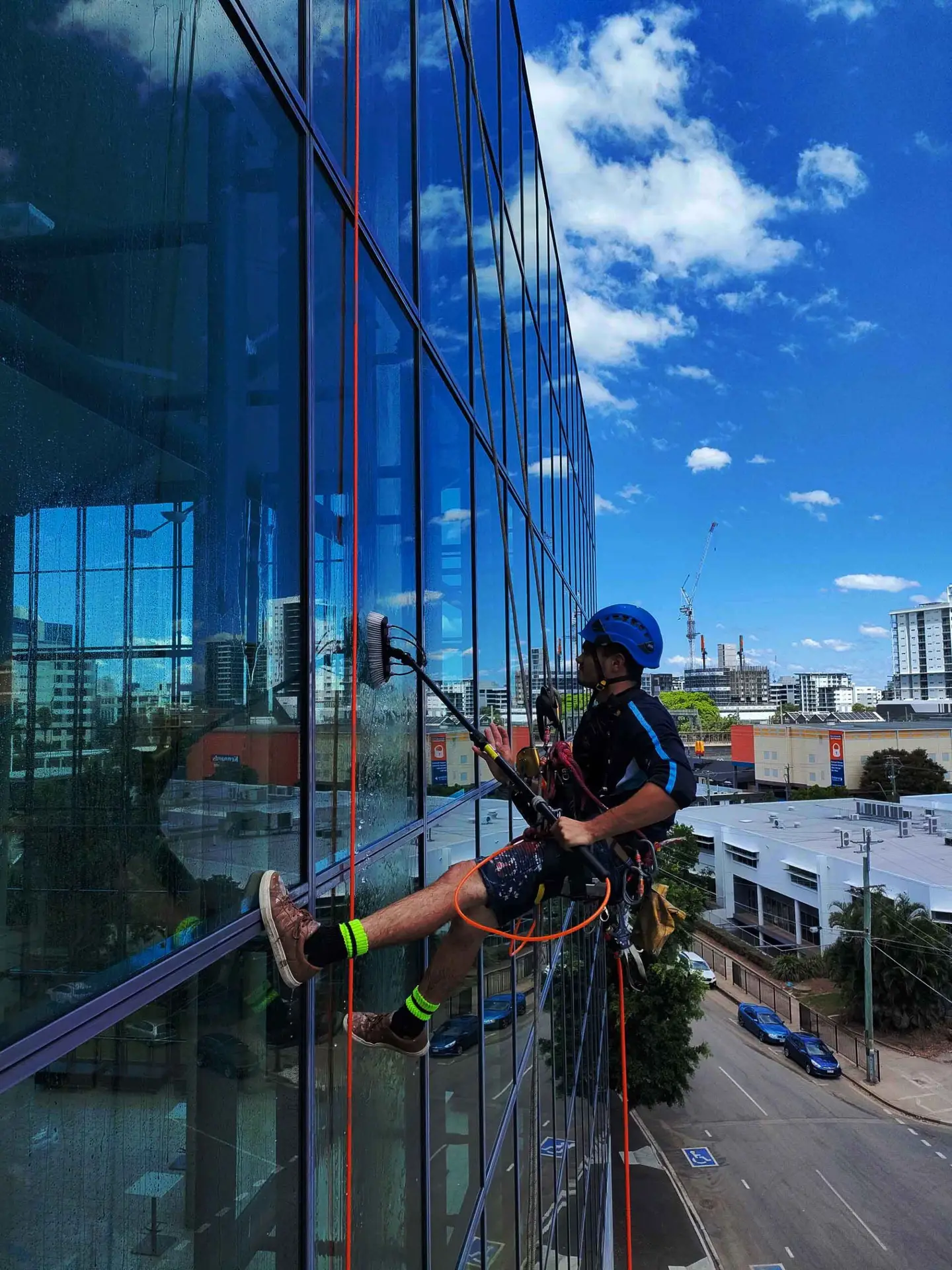 Professional rope access team on Suncorp Stadium scaled