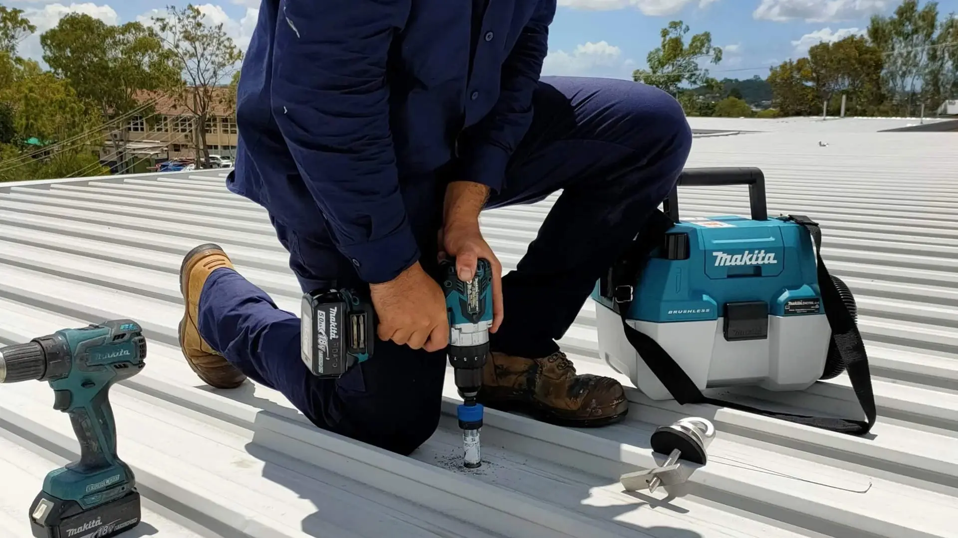 About 4 Matt-installing-anchor-points-on-rooftop